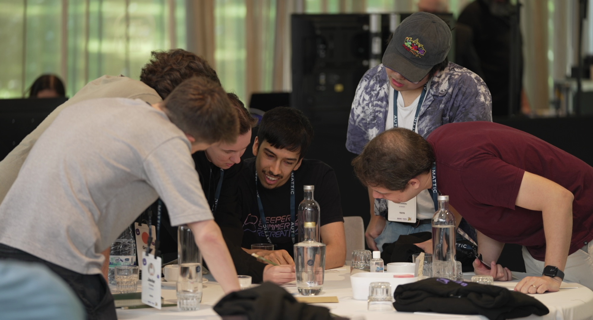 Group of people sitting around a table